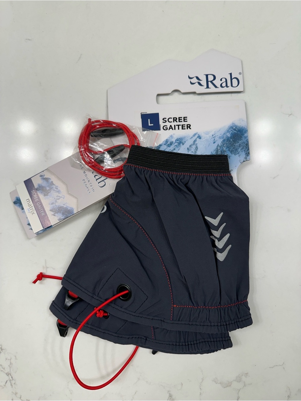 Rab Men’s Dark Gray Scree Gaiter with Red Cord - size large, NWT